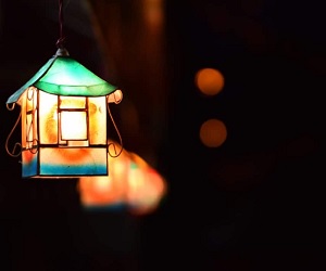 House lantern representing Dreamers Magazine Place & Home Writing Contest